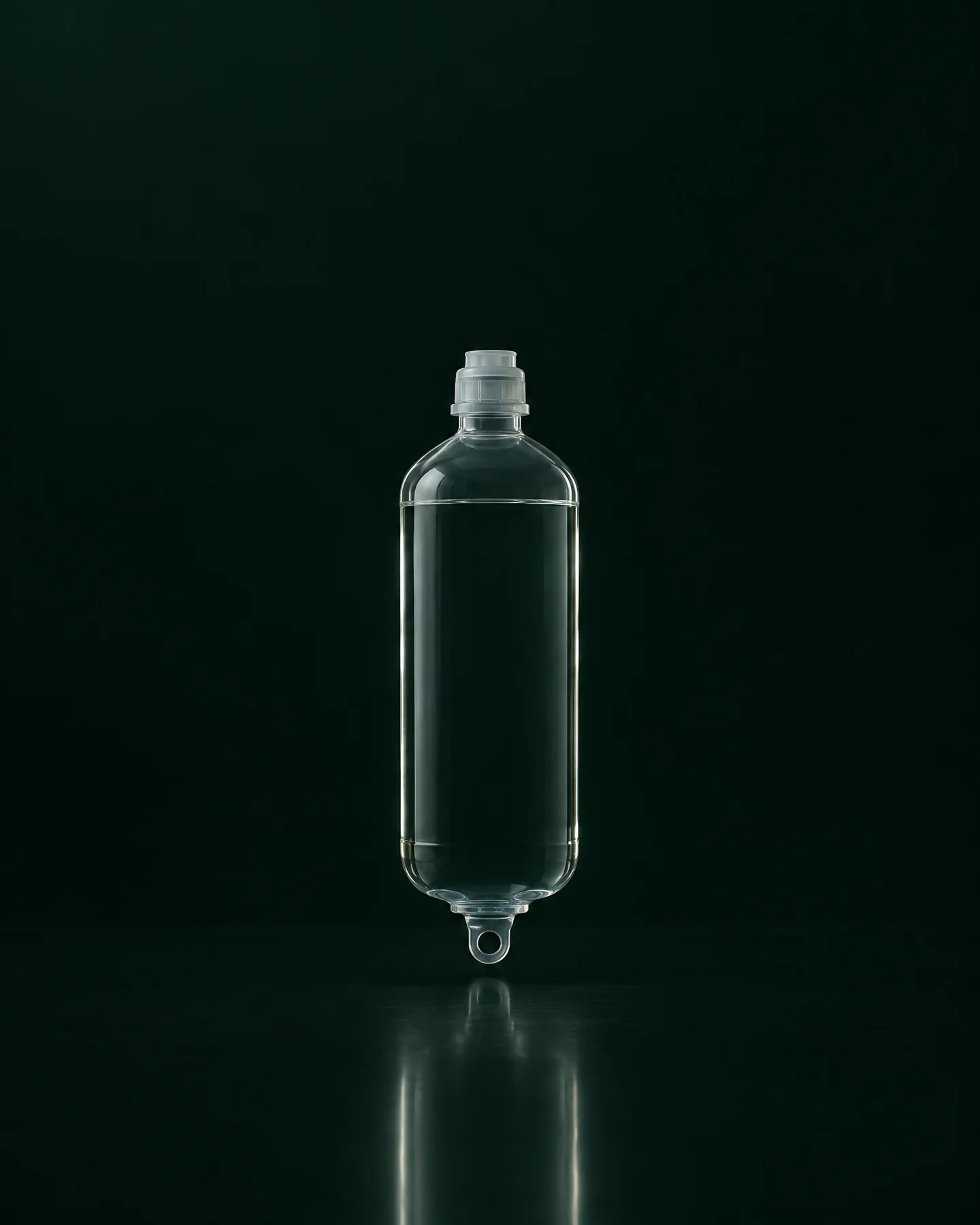 A plain IV bottle in a dark inspection booth.